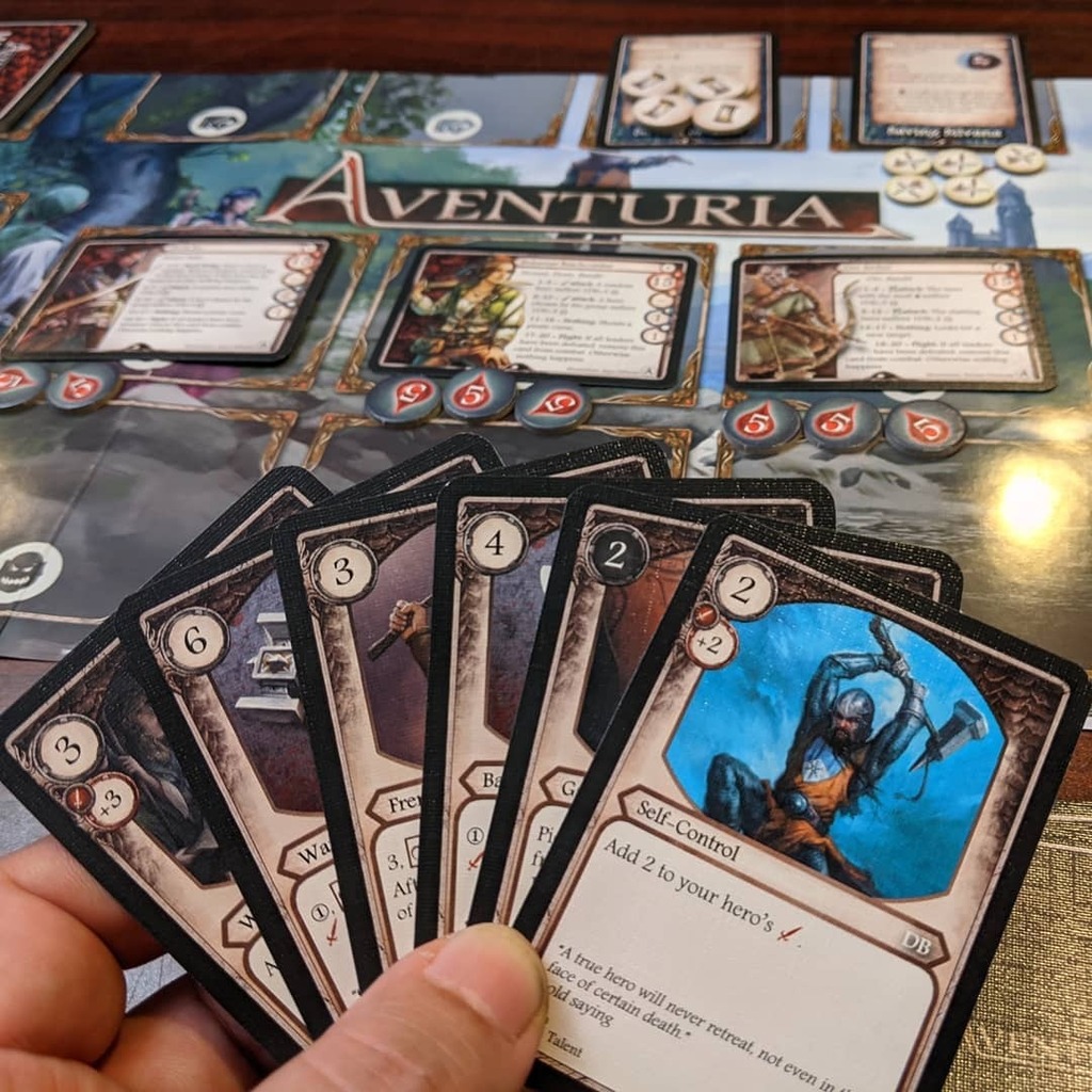 TabletopBellhop's tweet photo. A hand of cards in a game of Aventuria.
Check out my review on the blog and/or YouTube.
#AventuriaAdventureCardGame #Aventuria #AdventureCardGame #CardGame https://t.co/5J2iMI2TKh https://t.co/EKrIZPzhOj
