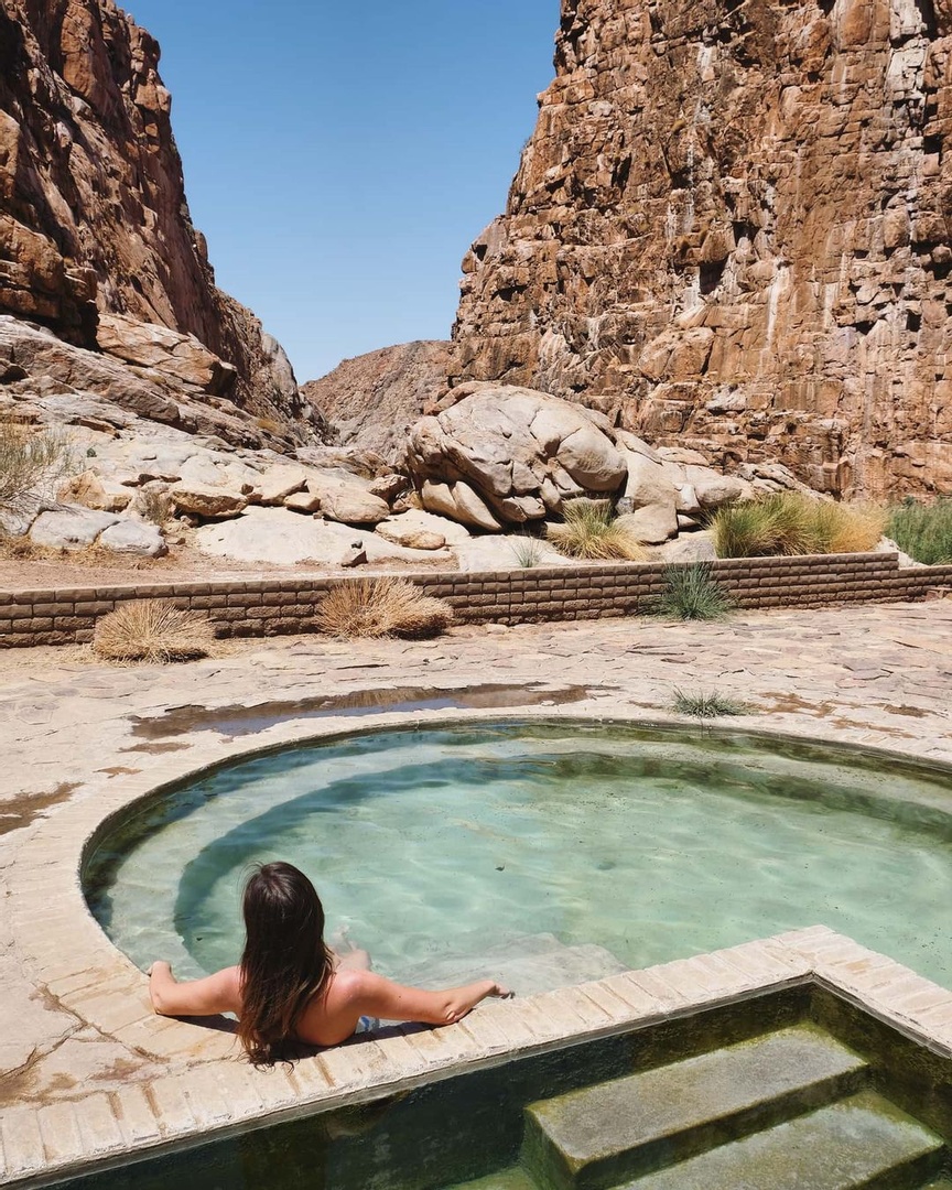 Ready for some rest and relaxation? Tucked in between towering granite rock formations are the Riemvasmaak Hot Springs, where you can enjoy a soak after exploring the mountain desert. #MeetSouthAfrica🇿🇦

📸 : marli.vaneeden