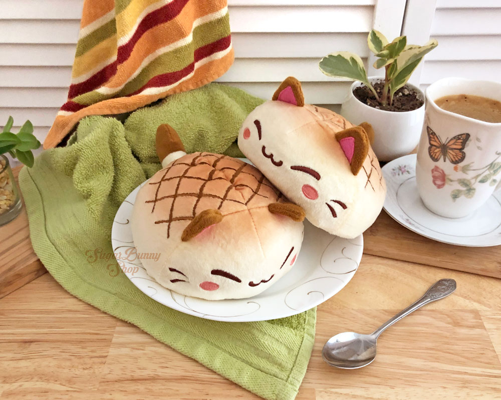 I wrote up a post with more details about all of the extra items in the plush Kickstarter! Wood pins, stickers and bread bags, oh my 🐱🍞💚 
