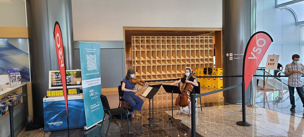 scolarson's tweet photo. They literally have the Vancouver Symphony Orchestra playing music for the vaccine lineup.  What a country.... #Canada https://t.co/d1pNRPo7ep