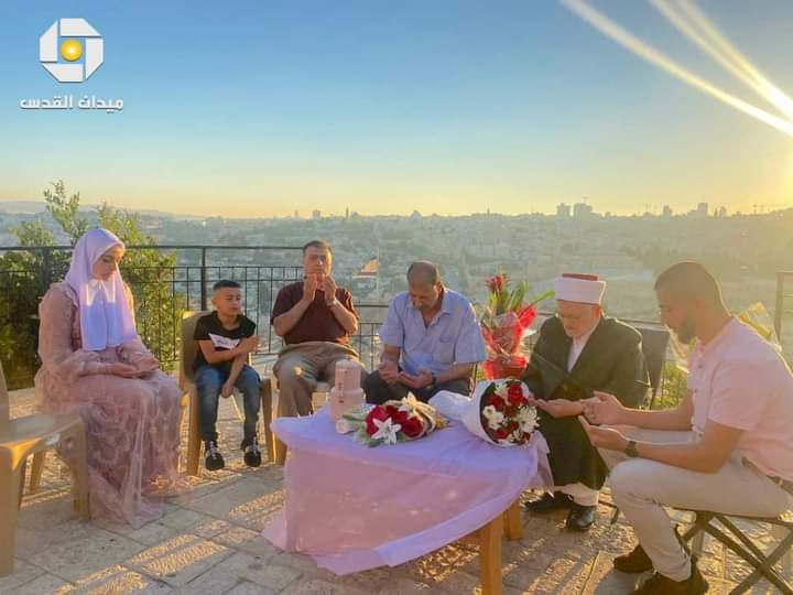Sheikh Ikrimah Sabri officiates a Nikah on Jabal Tour in al-Quds overlooking Masjid al-Aqsa today