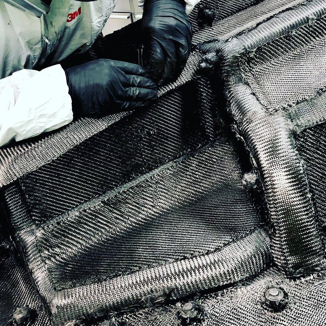 RodinCars's tweet image. Hand laying dry carbon fibre for resin infusion on the #rodinfzero mono mould build. Twill carbon fibre is placed to achieve a quasi-isotropic laminate. Next step, we vacuum bag the part and resin infuse with high temp tooling epoxy resin.#manufacturing #composite #engineering