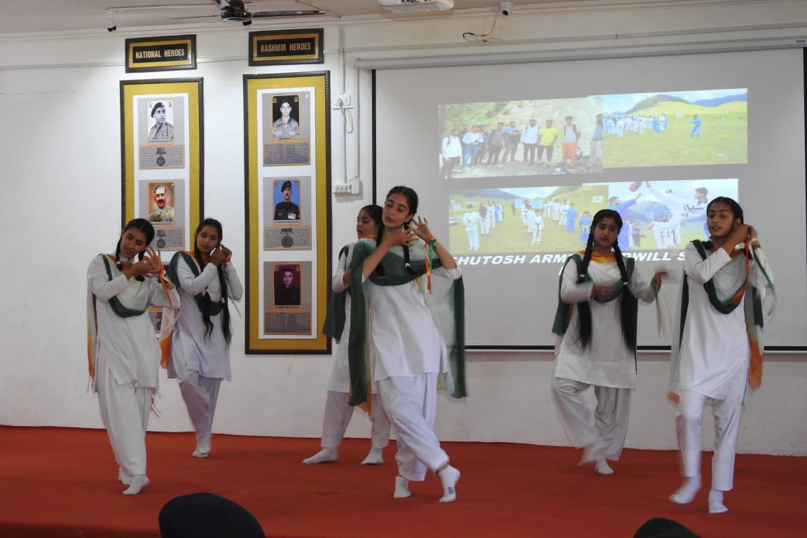 NorthernComd_IA's tweet photo. In #Budkot, #Handwara ‘Ashutosh Army Goodwill School' was renamed &amp; dedicated in memory of Late Colonel Ashutosh Sharma, SM**. Mrs Pallavi Ashutosh addressed everyone, unveiled the AGS Journal and Ashutosh Gallery and a group dance by students was conducted. https://t.co/qUl90l9x6J