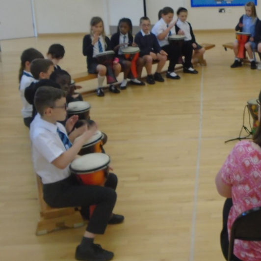 AllFaiths_TSAT's tweet photo. #ThinkingArtistically #ThinkingInclusively Year 4 enjoying their weekly Djembe drumming lesson https://t.co/NjYCRcFKYh