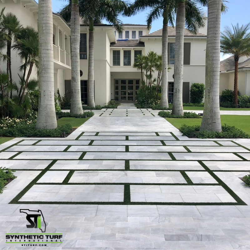 TurfFlorida's tweet image. This driveway design is sure to make you stop scrolling through your feed.😍 
#turfdesign #drivewaydesign #turf #stiflorida