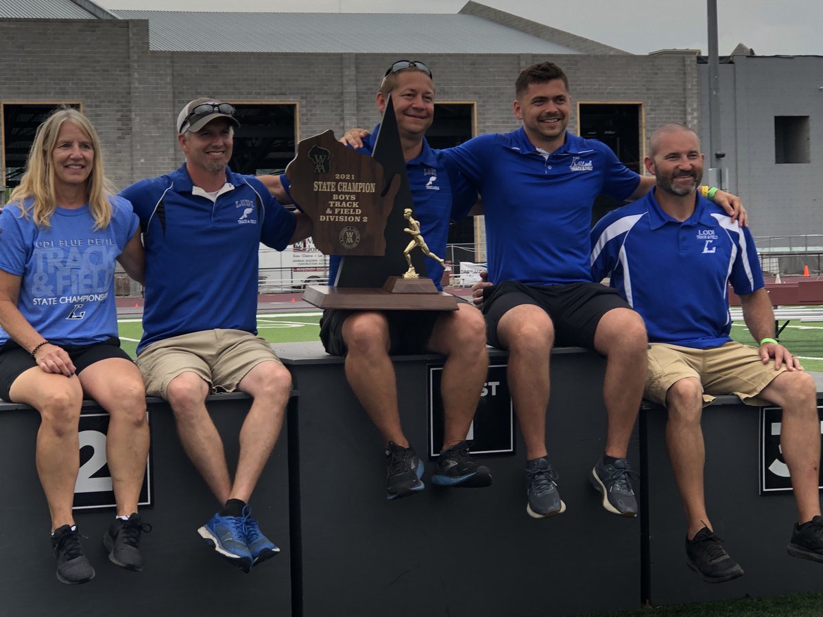 LodiHighSchool's tweet photo. Lodi coaches holding the Division 2 state track title trophy! https://t.co/jsLiJASgKf