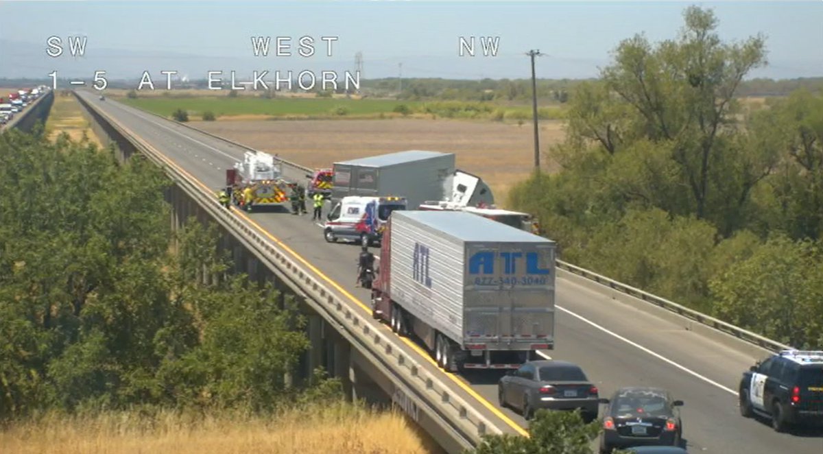 UPDATE: Both lanes of NB I-5 at the Yolo Bypass are now blocked with emergency vehicles on scene for a big rig hanging over the bridge. No ETO <a href="/YoloCountyCA/">YoloCountyCA</a>