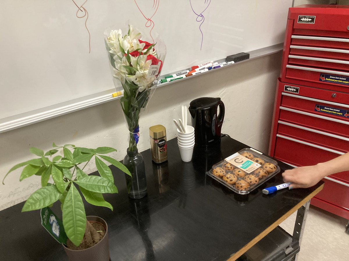 GSarty's tweet image. Flowers and chocolate chip muffins from my grad students to celebrate the end of my 6 years as department head. So nice!