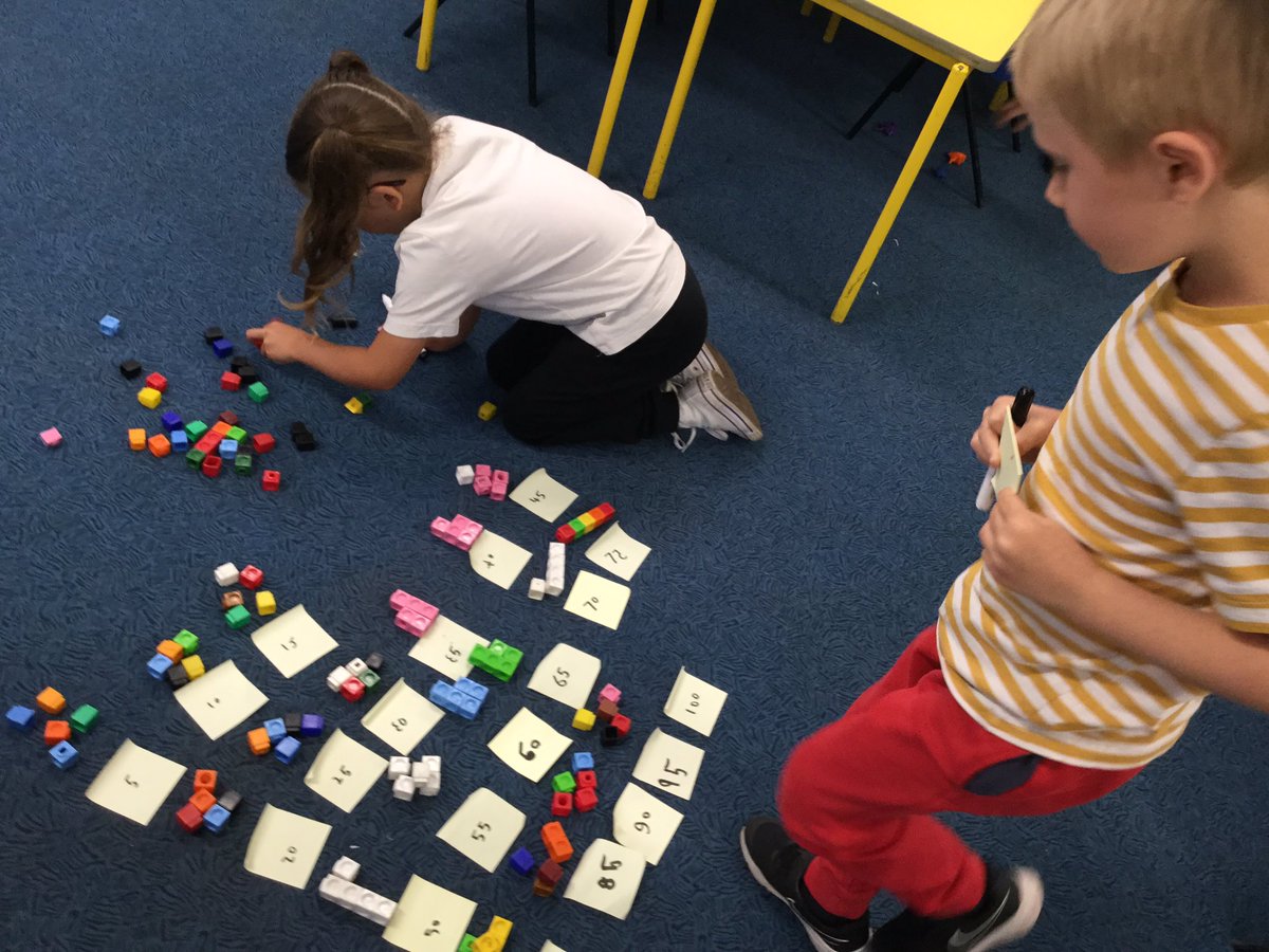 badgers_Y1Y2Stl's tweet photo. Butterflies took on their maths challenge very well! Can they work out how many cubes are in the box? They used their knowledge of grouping and counting in 5s. It took some time and teamwork! Well done 🦋😊 #StLMaths @stlaws_school https://t.co/p8QRVzfM2r