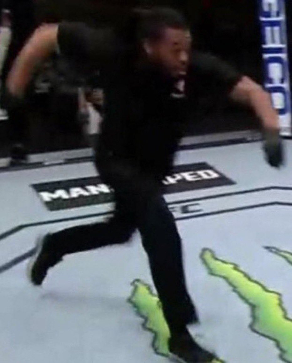 chasingring5's tweet photo. Herb Dean when he remembered he bet on it not to go the distance #UFC264 https://t.co/9gBK9L8Hij