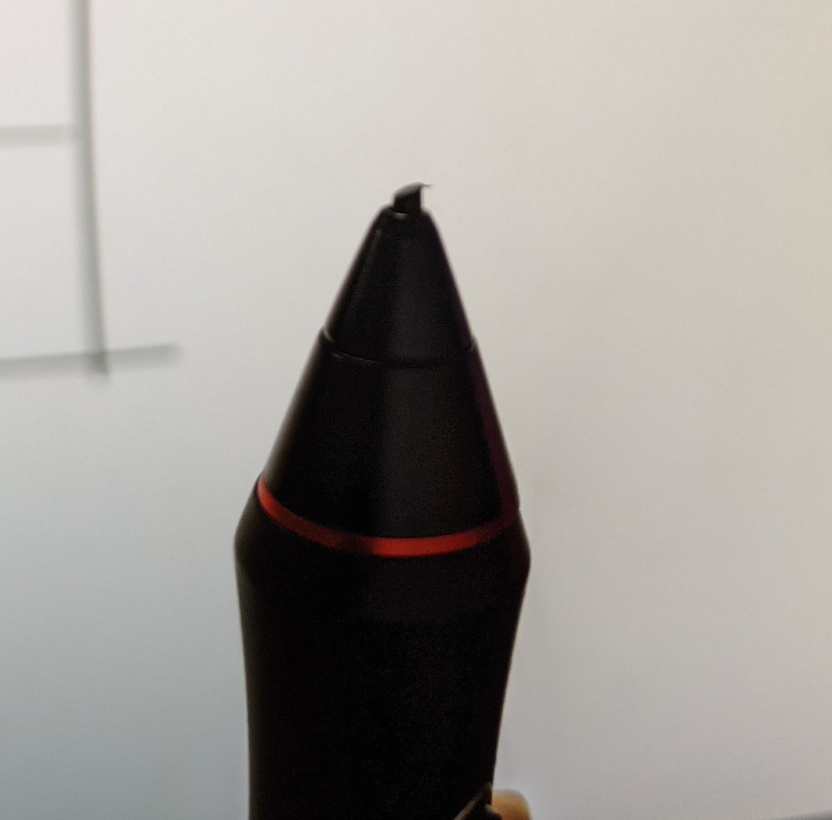 FinnieTheFish's tweet photo. I just bought Wacom intuos with pen for a month. And now this is what left of my pen nib!? https://t.co/5RiWZ3dWWQ