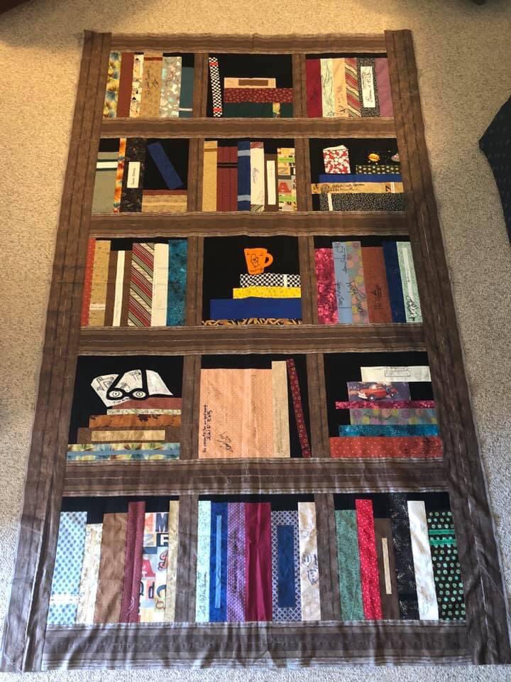 Teacher_AWebb's tweet image. Anyone remember the bookshelf quilt from #nErDCampMI ? This popped up in my memories today and this quilt has become so much more cherished because it was the last year of Nerd Camp MI. Missing all of you this week! 🤗 Thanks to ALL those who signed my quilt!