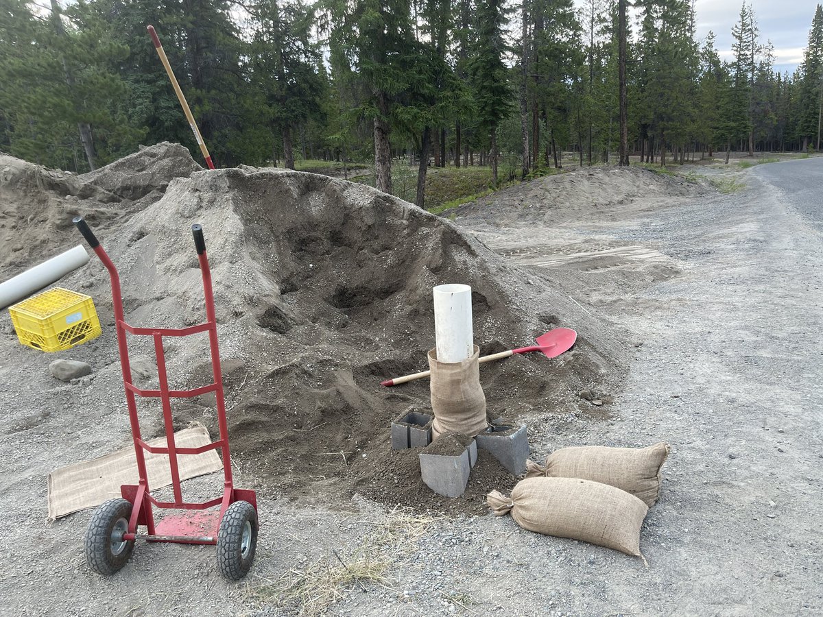 Sandbagging science fair: People have built devices to try and help the process.

Personally I prefer using a hard plastic tube. It keeps the bag rigid and easy to fill. Some cement blocks keep it stable.

#Yukon