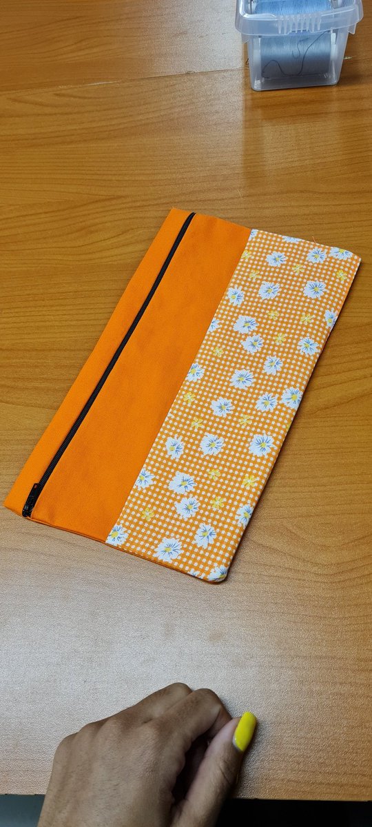 Cleotammy's tweet image. Second sewing lesson. Learned how to add a zip. Made a pencil bag.   So proud!