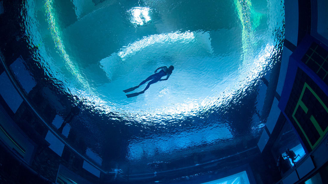 DXBMediaOffice's tweet photo. .@CNN: The Deep Dive #Dubai pool is filled with 14 million liters of fresh water, the volume of six Olympic-sized swimming pools, &amp; is at least four times bigger than any other diving pool in the world. @GWR awarded it the "Deepest swimming pool for diving" title on June 27. https://t.co/z7bcN9FZdH