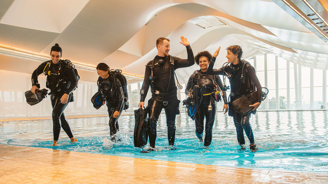 DXBMediaOffice's tweet photo. .@CNN: The Deep Dive #Dubai pool is filled with 14 million liters of fresh water, the volume of six Olympic-sized swimming pools, &amp; is at least four times bigger than any other diving pool in the world. @GWR awarded it the "Deepest swimming pool for diving" title on June 27. https://t.co/z7bcN9FZdH