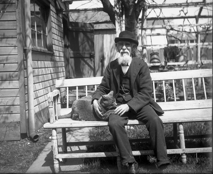 David D. Bartow and Moses the cat at their home on Herriman Avenue in 1904. Photo by William E. Case