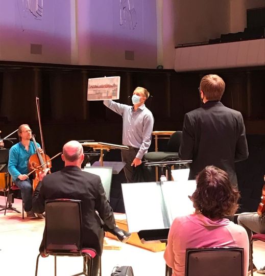 liverpoolphil's tweet photo. To mark the end of Vasily Petrenko’s tenure as our Chief Conductor, the Orchestra presented Vasily with a painting of Liverpool’s skyline during yesterday’s rehearsal for his final concerts.

The painting was by artist @Deborah_Butler

Thank you Vasily for 15 wonderful years🎶🎼 https://t.co/PGf2f7KDJ3