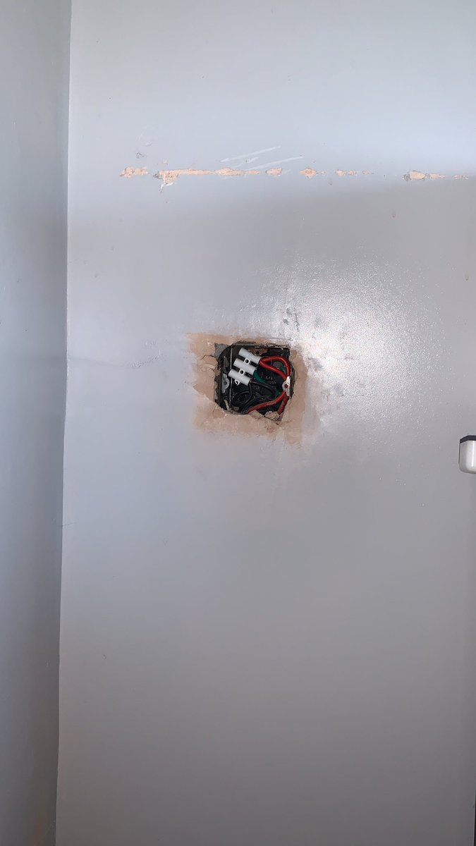 chellemccann's tweet image. We’ve just moved the fridge in our kitchen to find this….following a kitchen renovation 3 years ago! Is this something I can fix? We’ve a new fridge coming tomorrow! #electrician #plugsocket