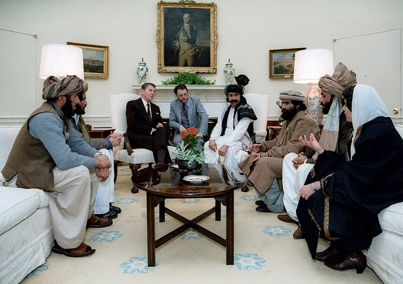 johnstanly's tweet photo. How did it begin 

President Ronald Reagan meeting with Afghan Mujahideen leaders in the Oval Office in 1983. #Afghanistan https://t.co/tZ9F0GTpe5