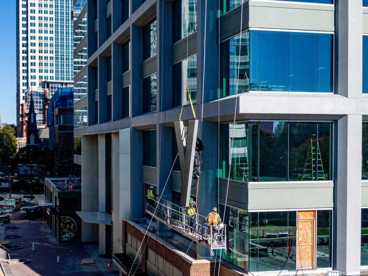 AllyCLTCenter's tweet photo. We’re proud of our team, and have been honored to work with every person who has contributed to Ally Charlotte Center. #FBF to the installation of our ‘@Ally’ sign by said team…426 feet in the sky!

📷: @The5and2Project | #AllyCharlotteCenter https://t.co/zQxqjkZBZP