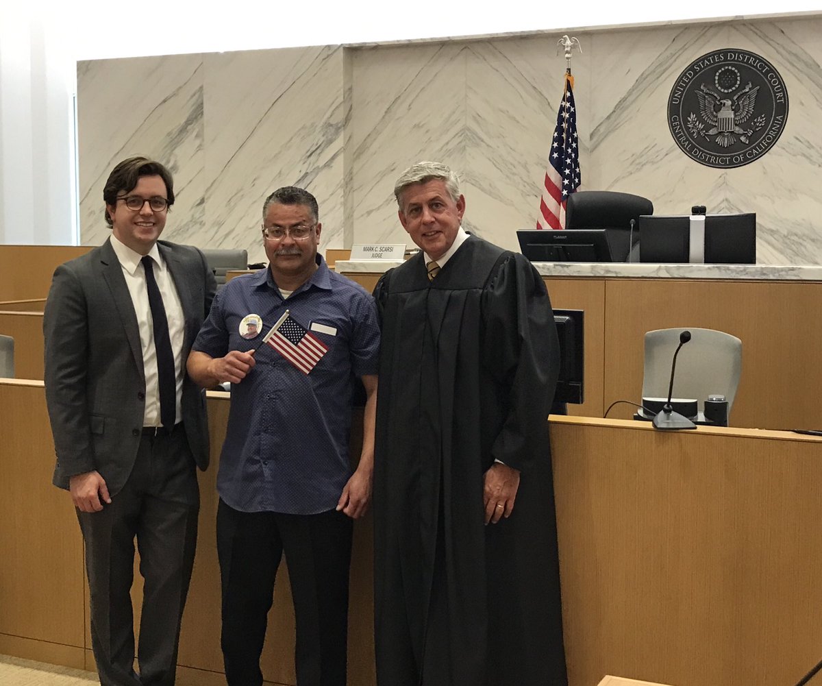 LindaDakinGrimm's tweet photo. Great day #Immigration world. Our #deportedveteran client Hector Ocegueda was paroled into US, interviewed by ⁦@USCIS⁩ and sworn as a citizen in a moving ceremony by Federal judge Mark C. Scarsi. With Milbank lawyer James Behrens ⁦@MilbankLaw⁩ ⁦@PublicCounsel⁩ https://t.co/Zd1L7bXmuj