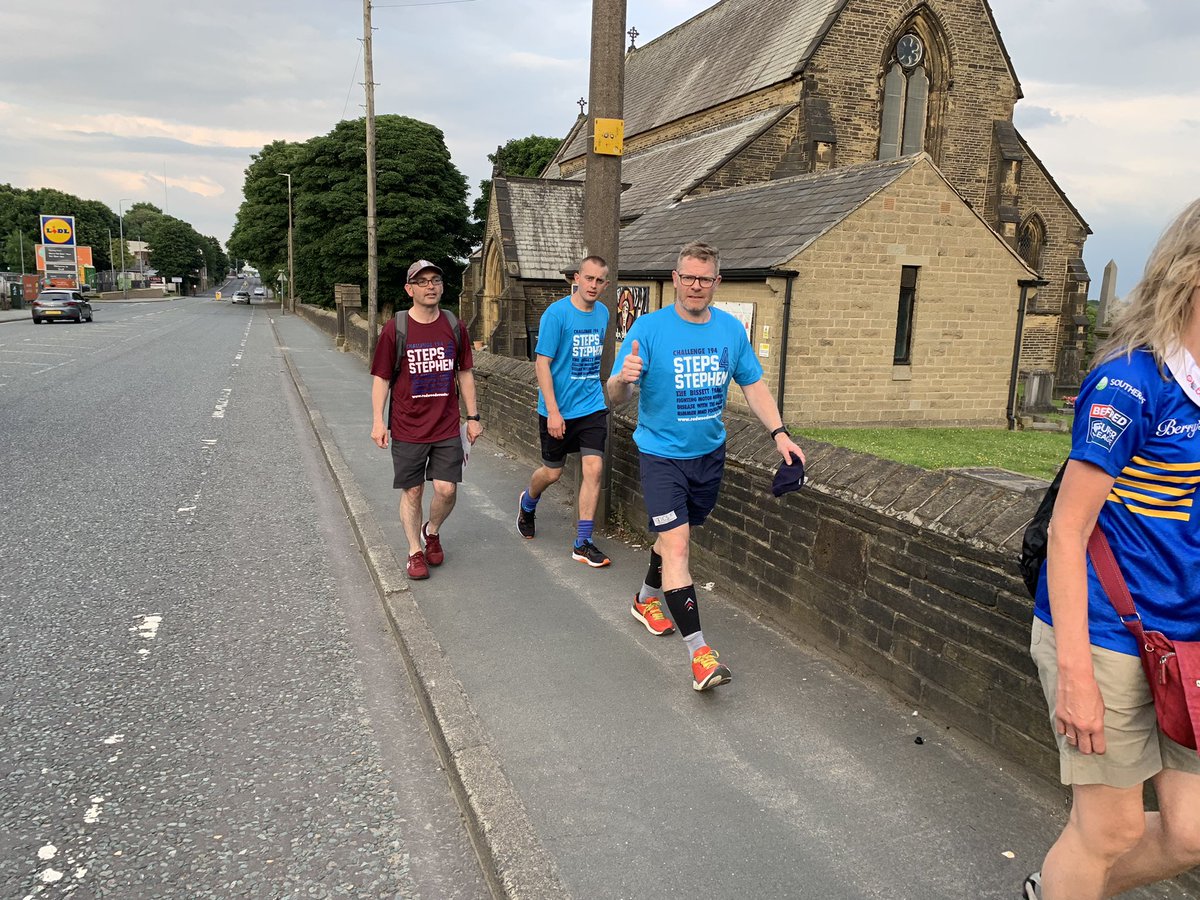 Redsmail's tweet photo. #Steps4Stephen Day 1 finally comes to the @HalifaxPanthers after 65km. Andy, @BissettScott & @HarryHbiss weary and ready to rest. Met at the end by Panthers S&C man @aholleyhead8. So many people today have helped us support @DarbyRimmerMND. And now Andy needs a rest!!! https://t.co/NUhdhH1gZI