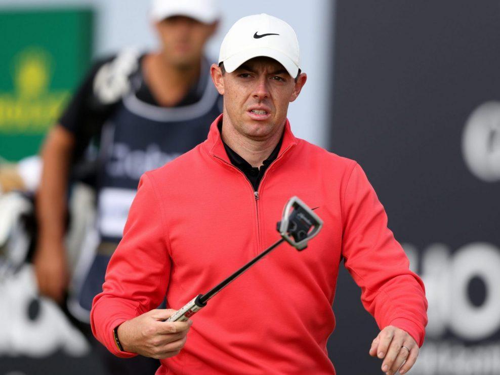 SCOTTISH OPEN DRAMA Spectator grabs Rory McIlroy's golf club, takes swing