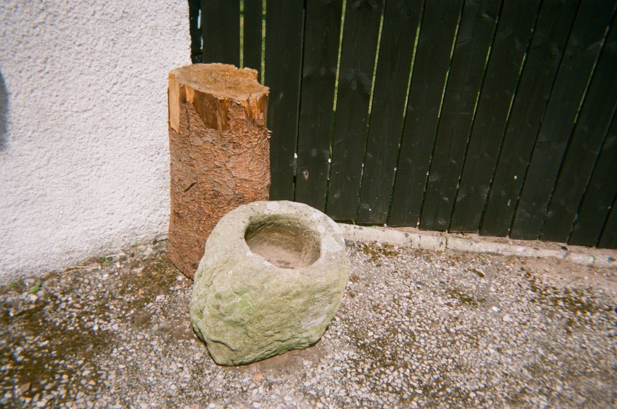 This photo taken by Rod MacKenzie of Hilton of Cadboll Farm shows the quern (meal mill) brought by an ancestor to Hilton by boat after being cleared from near Helmsdale. Must have been very valuable to make such a journey - broke two wheelbarrows being moved to where it sits now.