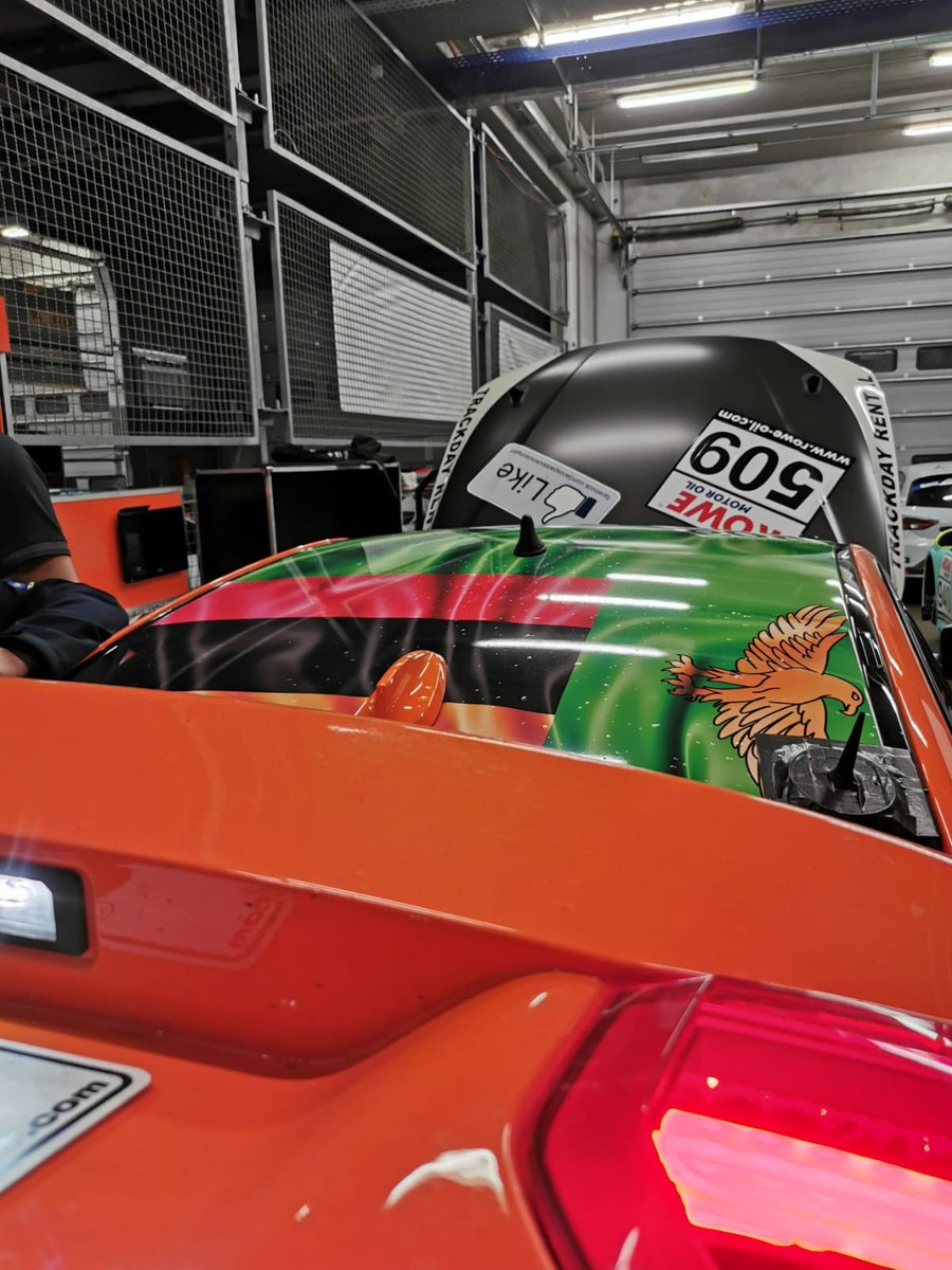 A_Higgins's tweet image. Why is there a Zambian flag on the roof of a racing car in Germany?? Because we do the marketing and website for @JacosPaddock. All their race cars have flags on the roof and they thought it would be cool to do the Zambian flag as a surprise for us on their newest BMW F30 car!