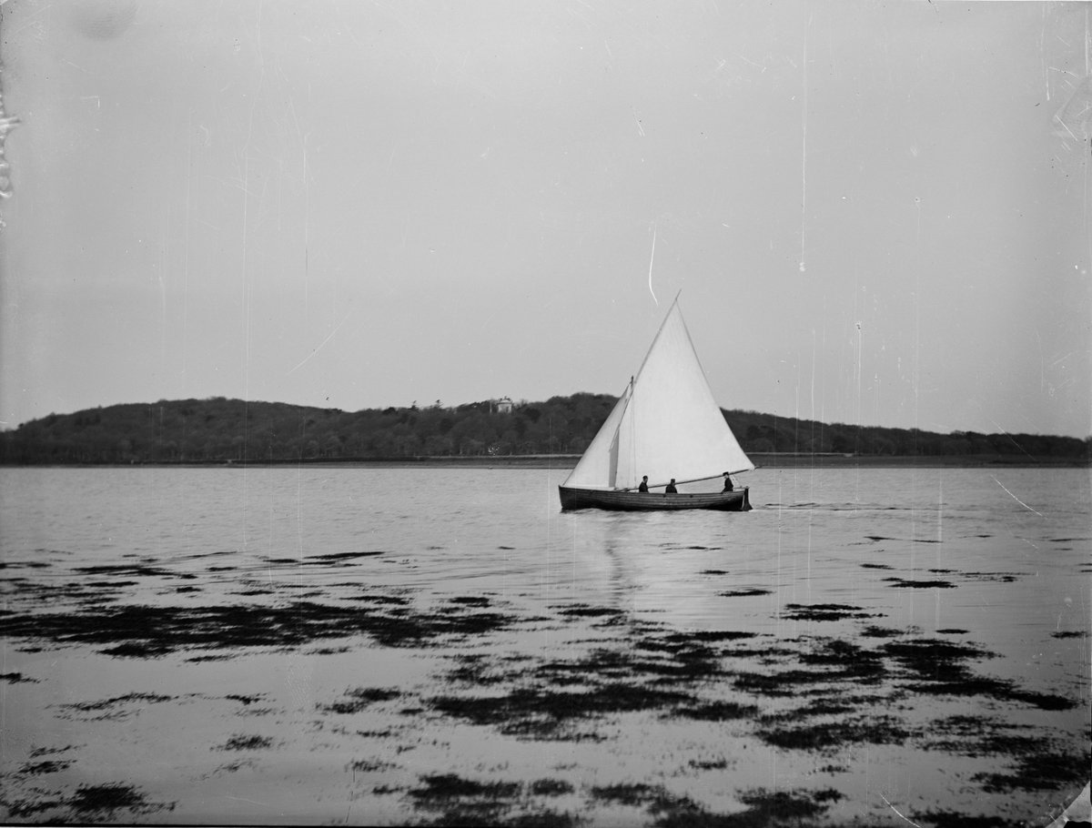 An archive photo from the Estate of the Marquess of Londonderry. The black and white photo shows the small boat, the Mountstewart, sailing on Strangford Lough.