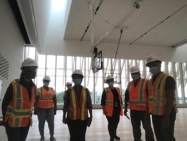 The Capital Design and Construction team checks out the triple gym at Churchill Meadows CC. Spectacular space with natural light and stunning views.