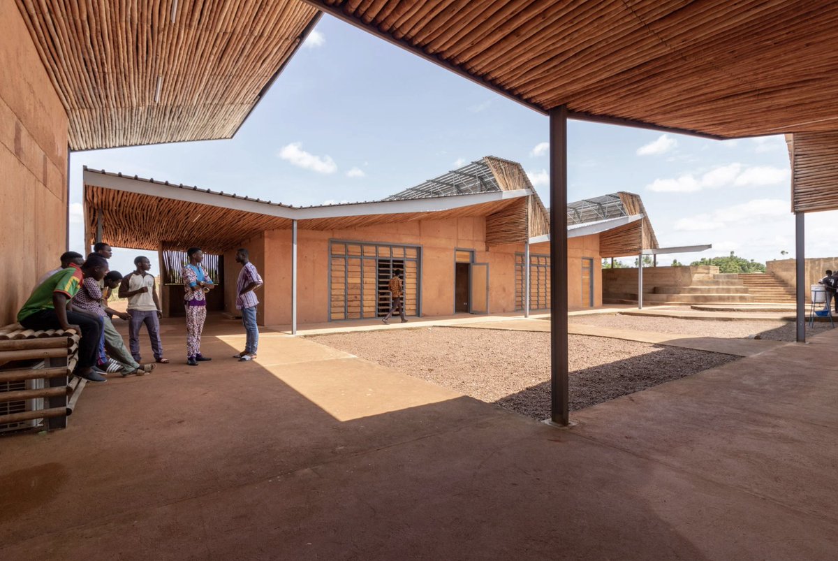 tomravenscroft's tweet photo. Looking great! Francis Kéré builds university in Burkina Faso from clay and eucalyptus wood – https://t.co/B6ICnDR5Jd (via @dezeen) https://t.co/wu678k0DvH