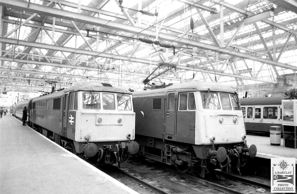 coombejunction's tweet photo. More black and white images being scanned today from the vaults. 86224 "Caledonian" meets 81003 at the buffers at #Glasgow Central, 21 March 1986. #Class86 #Class81 #BritishRail https://t.co/S4OYZ7OnLX