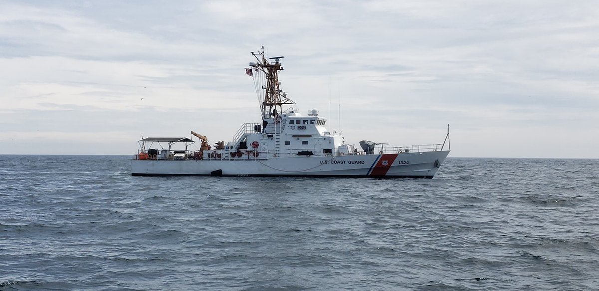 USCG's tweet photo. While conducting #LivingMarineResources boardings, a #USCG Cutter Key Largo boarding team inspected safety and fishing gear. The boarding team assisted in returning a porbeagle shark to the water after being caught as bycatch in the vessels nets while trawling. https://t.co/2q52GyTnwA