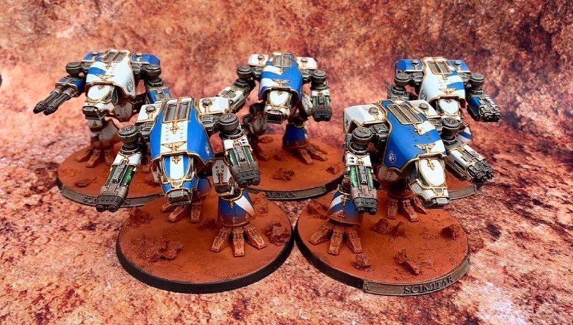 BenDavy8's tweet photo. After four months of painting my Legio Praesagius is done for now. Pretty happy with how they came out. I’m not taking a break to paint some Munda and then Legio Krytos. #WarhammerCommunity #AdeptusTitanicus #30k https://t.co/nMGWACDSvq