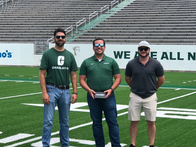 AstroTurfUSA's tweet photo. Great to present @CharlotteFTBL with Keys to the Field at @unccharlotte. Pictured are Charlotte's Brian Kugler, senior project manager, Cass Ferguson, assistant AD of facilities and Garrett Bare, regional sales manager for AstroTurf. #AstroTurf #OnOurTurf #GoldStandard https://t.co/9Z7AlfCzSg