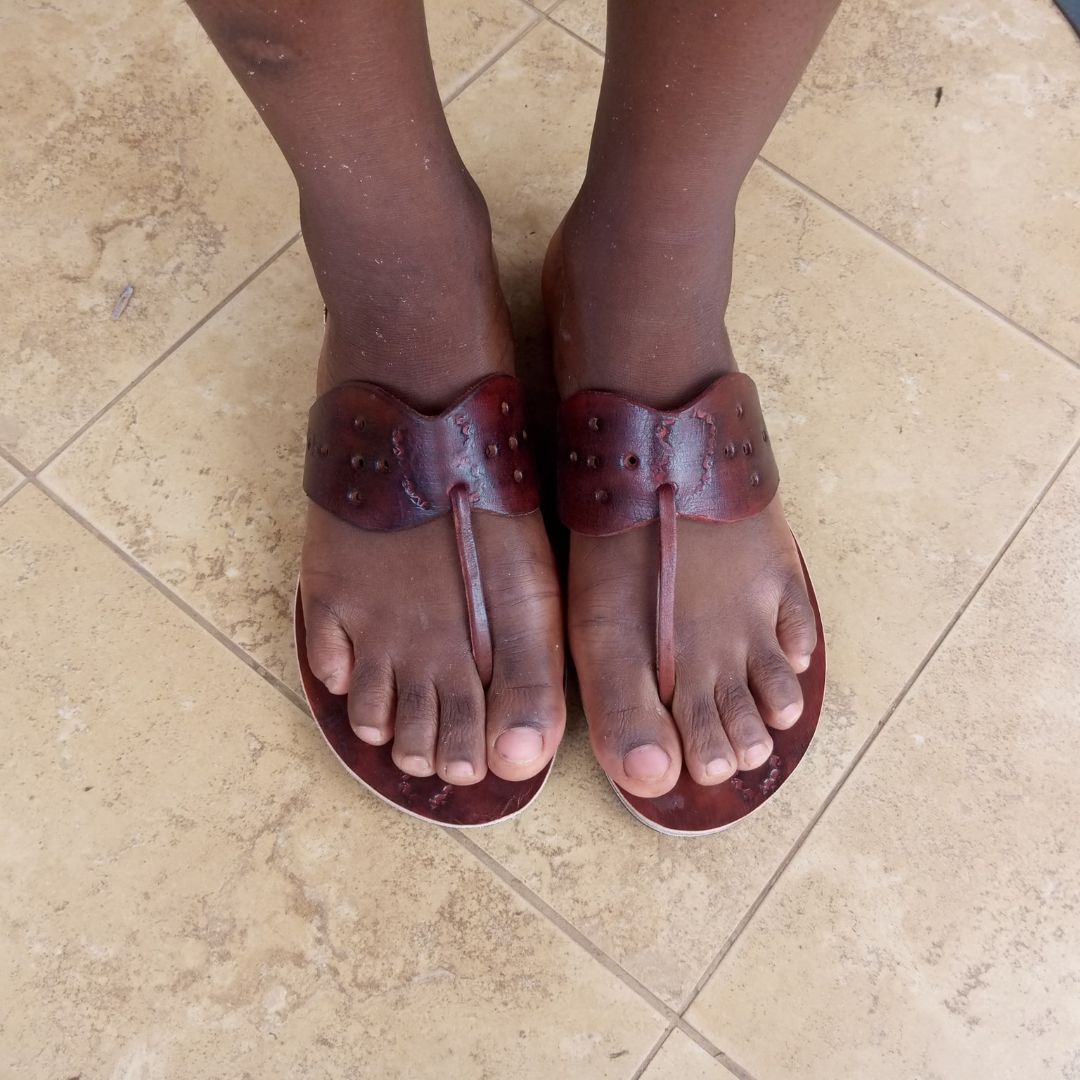 HALOFoundation's tweet photo. Our kids at the HALO Learning Center in Uganda have made some serious progress on their shoemaking project. They started the project by making a prototype out of paper and then moved on to cloth and leather. Scroll through to see the progression of their shoe project. https://t.co/rdpfAfv5iB