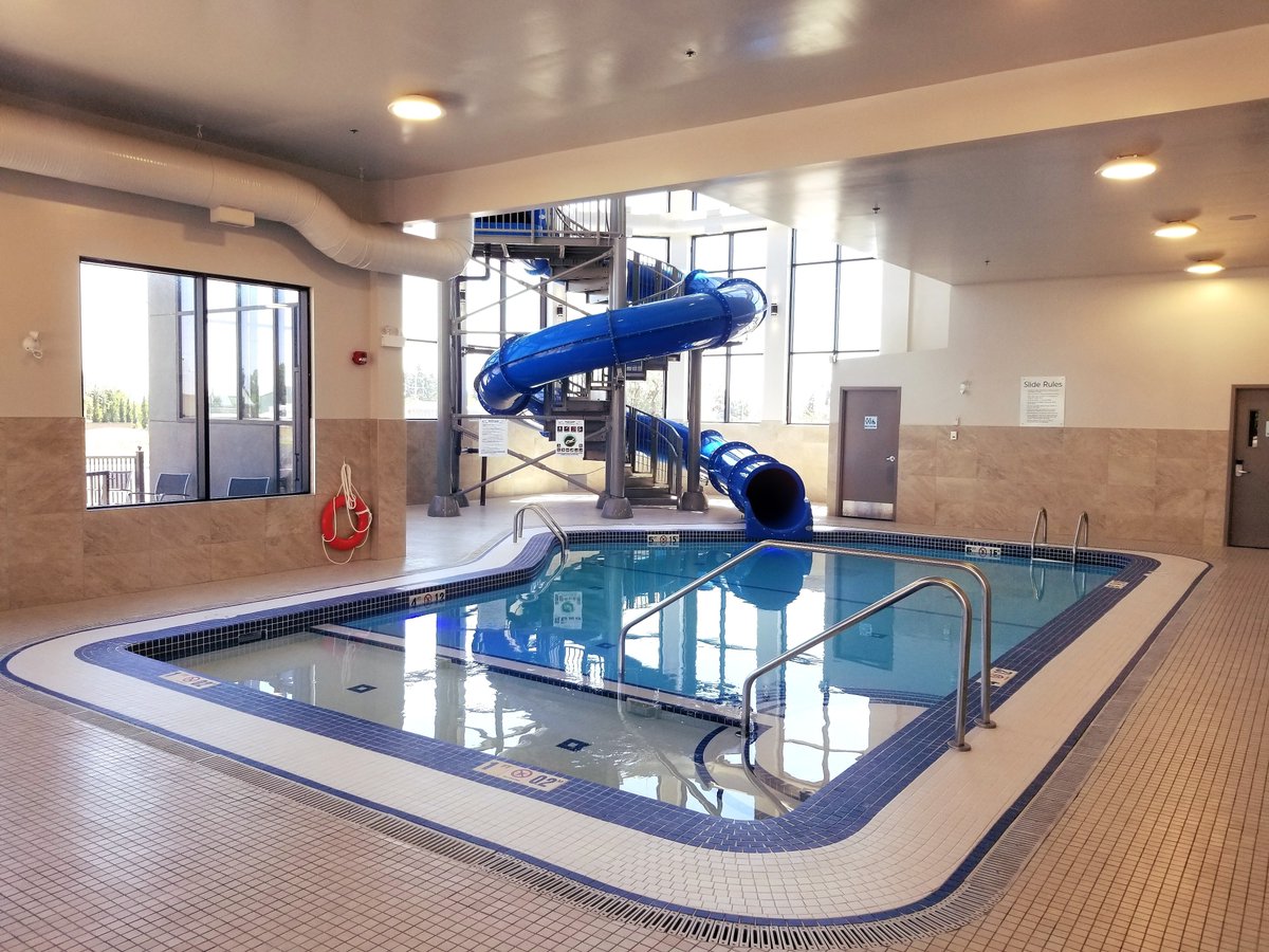 BwpLeth's tweet photo. Looking to escape the hot weather this week? 😎 Book a night with us and enjoy our large indoor water slide and swimming pool! 🌊
#yql #lethbridge #southernalberta https://t.co/vXKmuuipTV