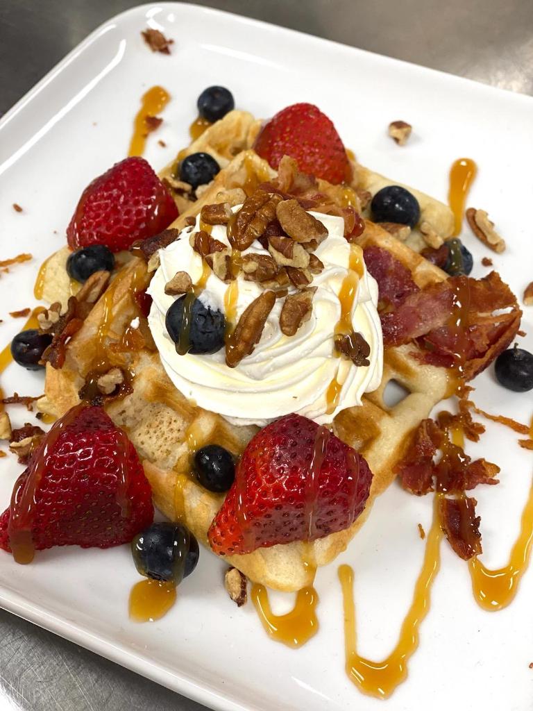 Our residents enjoyed delicious waffles for breakfast this morning to celebrate National Waffle Iron Day! #SeniorLiving