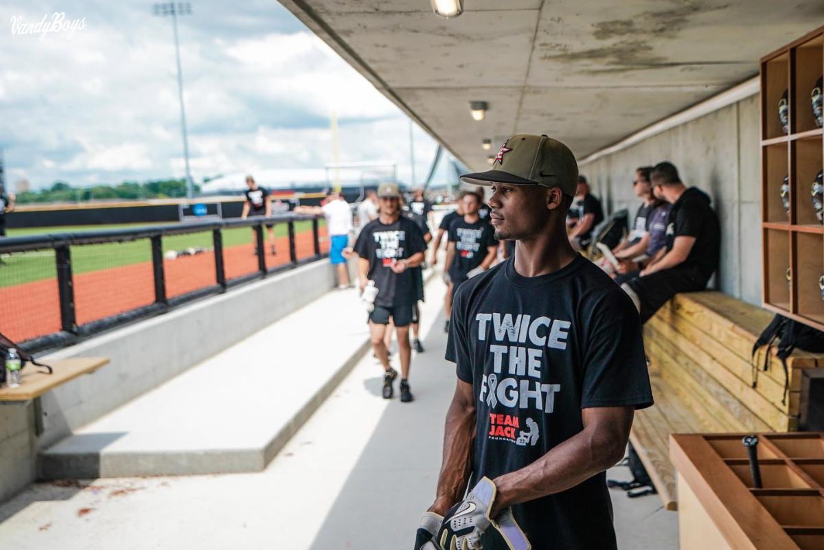 TeamJack's tweet photo. The Vanderbilt Baseball team is raising awareness for childhood brain cancer at the 2021 CWS wearing Team Jack Twice the Fight t-shirts and wristbands. We so grateful for the support and can't wait to watch Game 2 tonight! https://t.co/EHsCODPsAv #vandyboys #anchordown #cws https://t.co/9MMBrW0Qlz