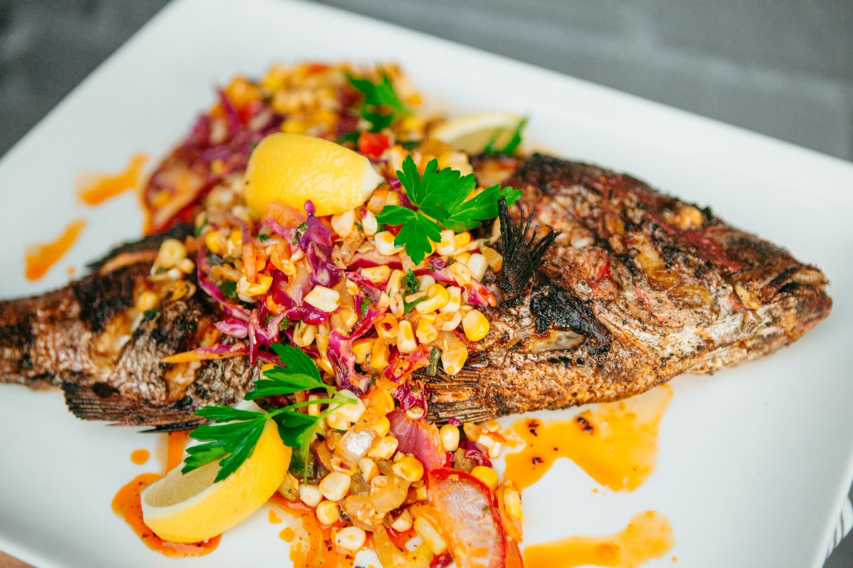 ALSeafood's tweet photo. Enjoy #redsnapperseason the right way— with a Roasted Whole Red Snapper from @theauburndepot. It's one of the most intimidating dishes to order, but we believe it's well worth the little extra effort. #alseafood https://t.co/gXL9Ch6WER