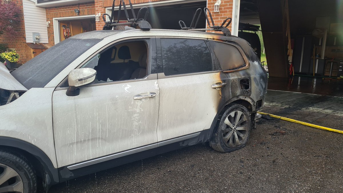 Adj-Tos STN 2 supported by STN 1 responded quickly to a working vehicle inside a garage. Quickly controled by ariving crews. Overhaul in progress.