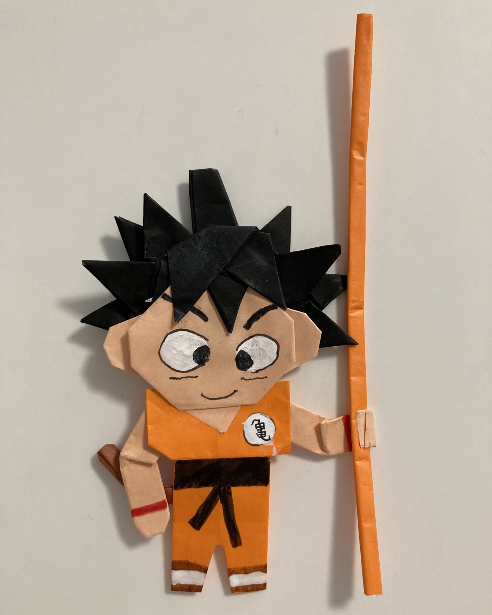 いもあん リクエストがあり 3体目の悟空を折る息子 1体目はオデコがベジータ寄り 2体目は凛々しい感じ 3体目は可愛い悟空 に仕上がった さすが 戦うたび進化する悟空 折り紙 Origami 鳥山明 ドラゴンボール 孫悟空 如意棒 ドラゴンボール