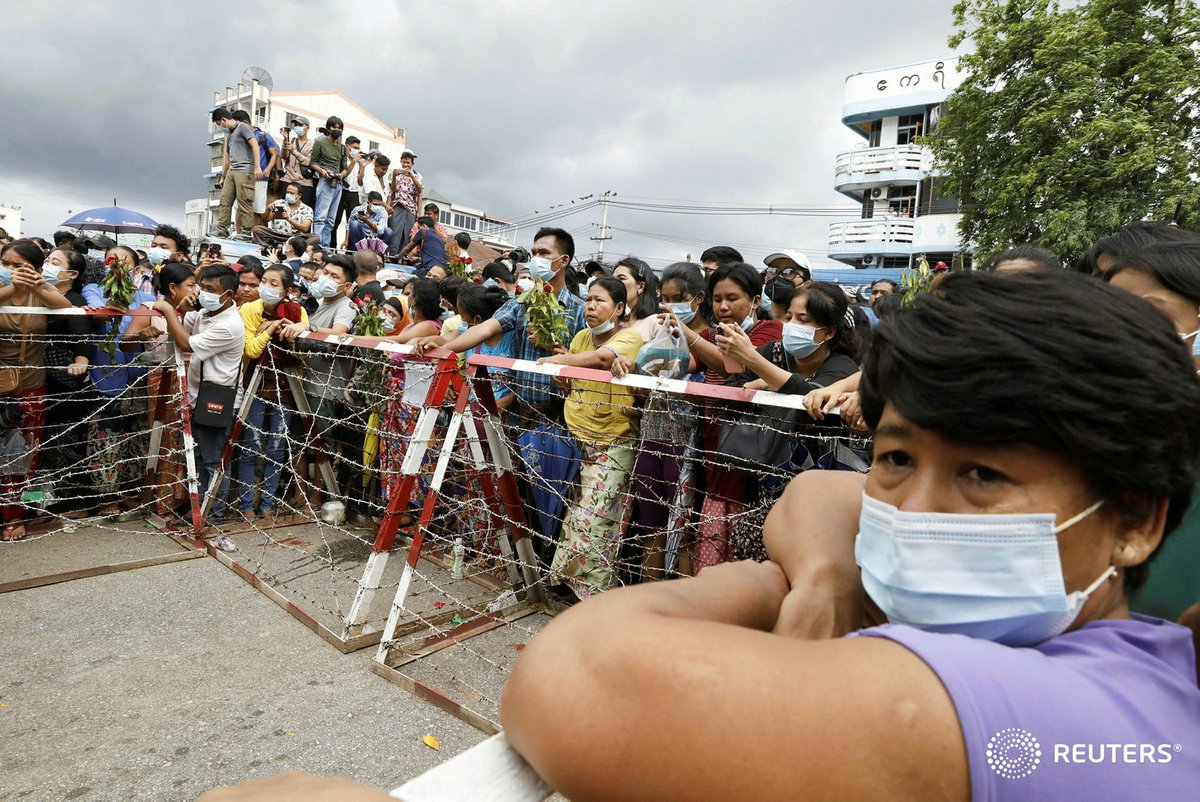 Families wait outside Insein prison after Myanmar's authorities announced to free around 700 prisoners in Yangon, Myanmar June 30, 2021. REUTERS/Stringer #WhatsHappeningInMyanmar