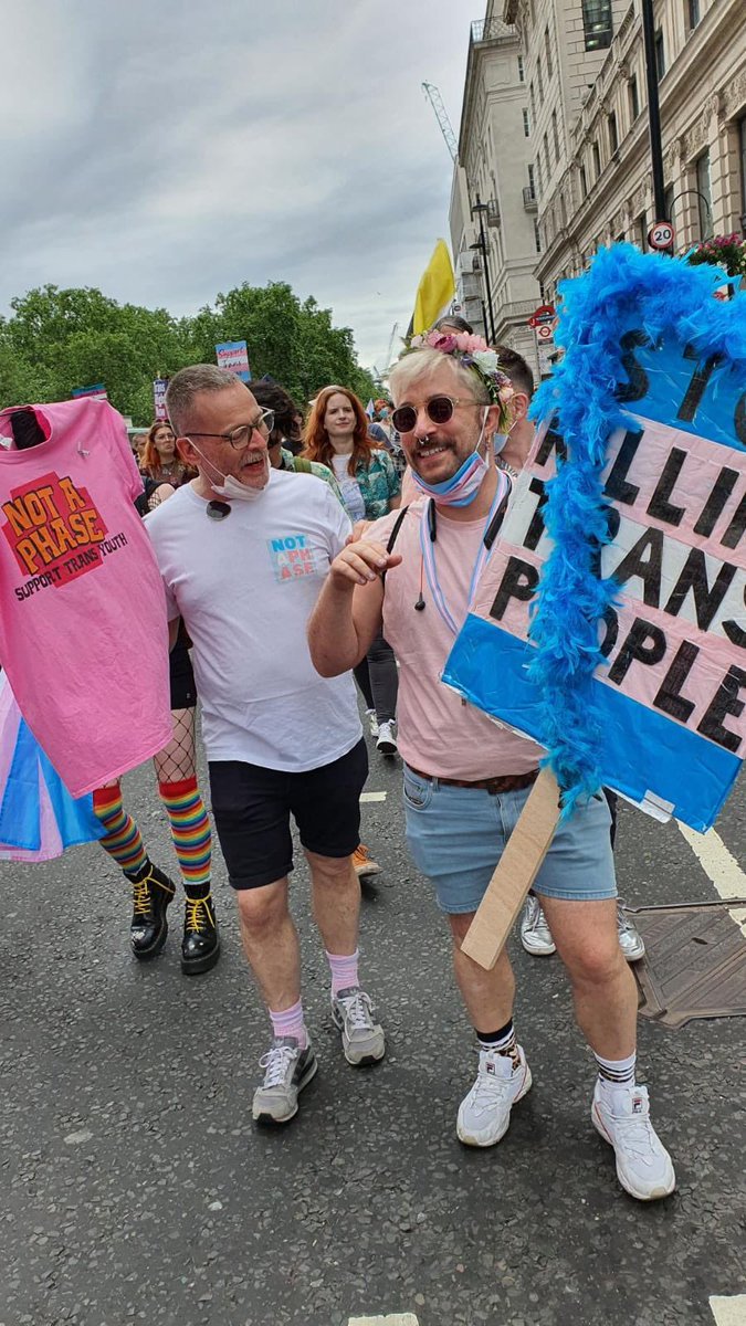 Just got sent this lovely photo from #TransPrideLondon I couldn’t decide which @NotAPhaseOrg t shirt to wear so I turned one into a banner thanks Andy for the photo