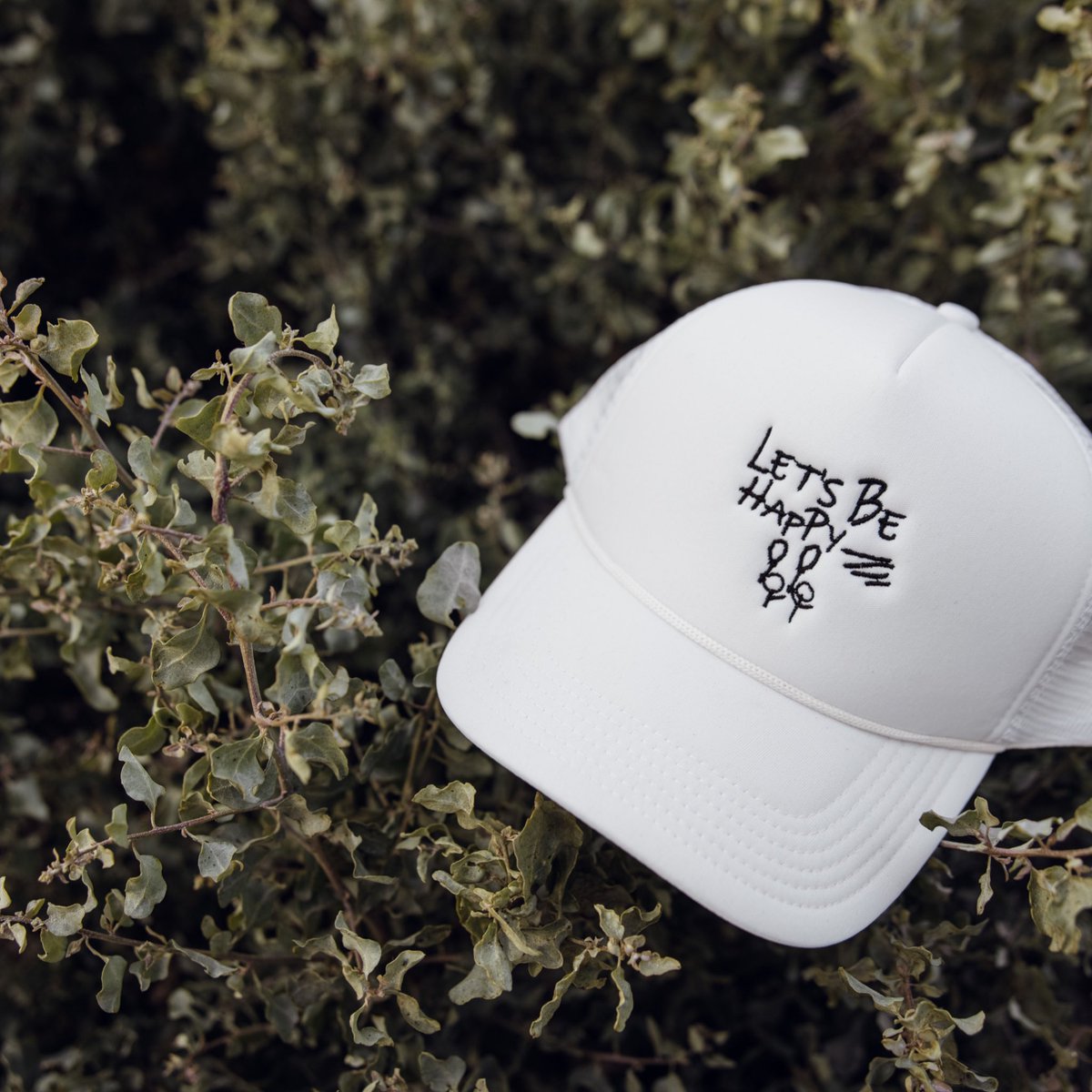 scottalnproject's tweet photo. “let’s be happy” trucker caps are available for purchase online  🎈 https://t.co/QAlOW2N4gY