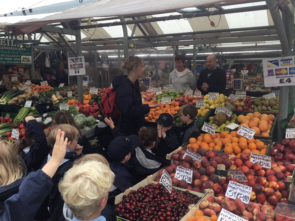stpeters2_8's tweet photo. Some children from Reception went on a trip to ‘Shelia’s Greengrocers’ at the Shambles Market - we found out about fruit from around the world, read labels and prices and estimated our total! John the Greengrocer was so kind and helpful! 😍😍😍 https://t.co/nhYMKwtNFB