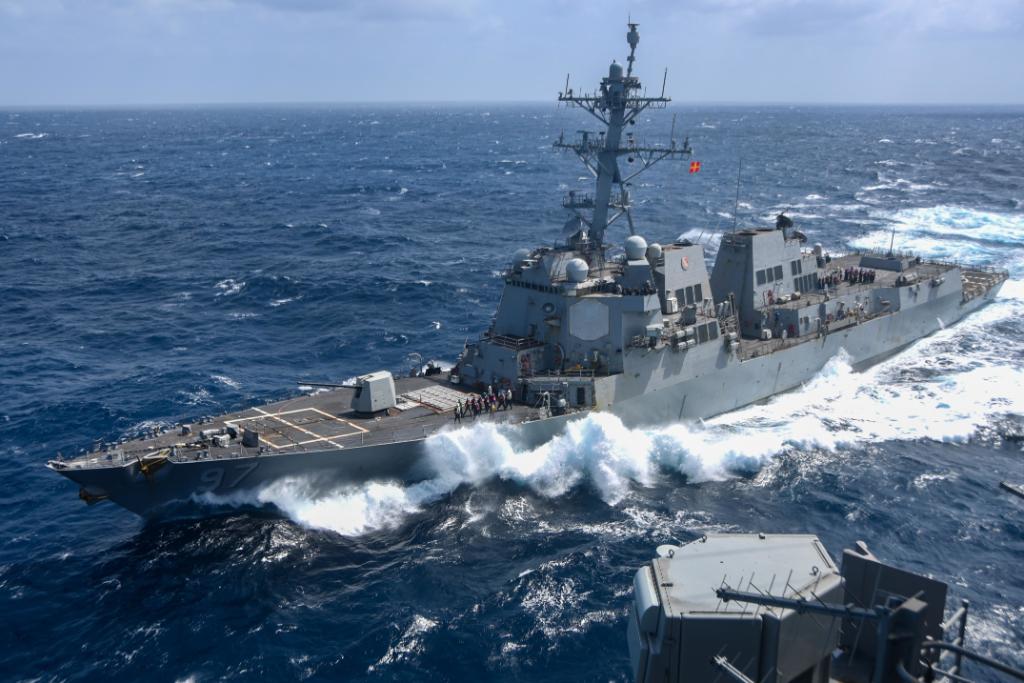 USNavy's tweet photo. ICYMI: #USNavy Carrier Strike Group 5 is officially in @US5thFleet area of operations! 

Pictured is the guided-missile destroyer #USSHalsey conducting a fueling-at-sea with the flagship for #CSG5, aircraft carrier USS Ronald Reagan @Gipper_76 in the #ArabianSea. https://t.co/Fqjb9uJxia