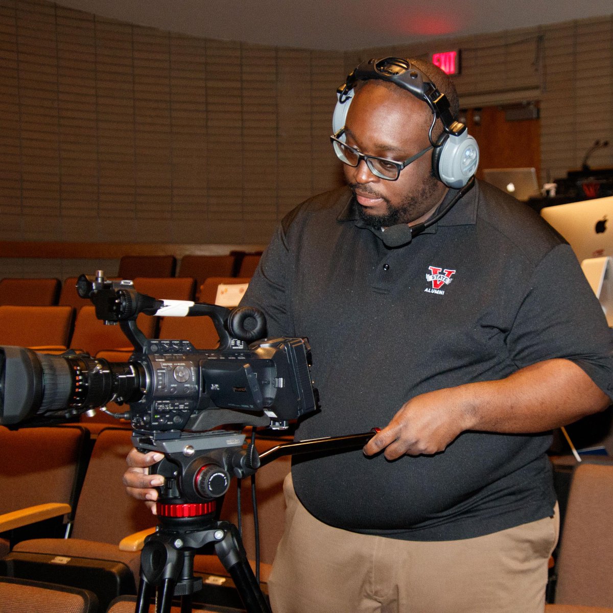 PSSTGA's tweet image. PSST Fans: How did we do it? There were 4 video cameras in the seating area and a video production switcher. 
Faculty members in the Dept of Communications Arts in these photographs: Dorrian Baber (video camera) and Andrew Black (video production switcher). 

#psstga #psstga21